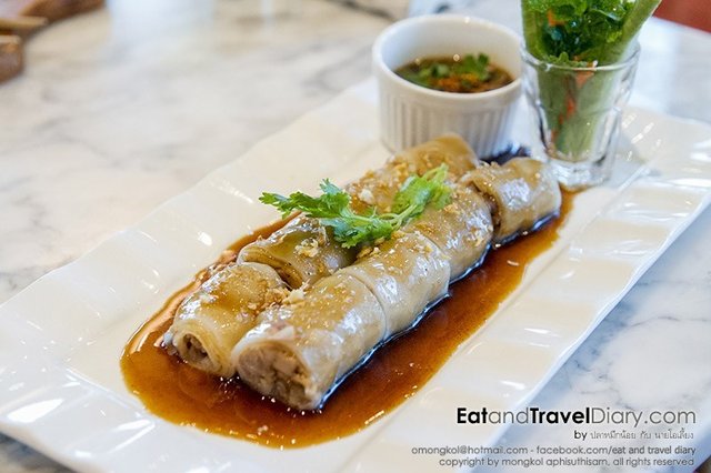 Grilled Marinated Pork wrapped in White Noodles